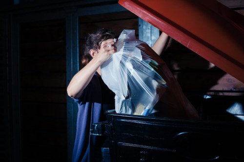 Workers sorting demolition waste materials